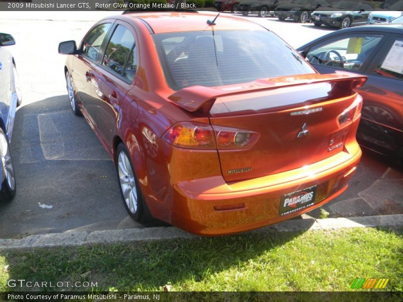 Rotor Glow Orange Metallic / Black 2009 Mitsubishi Lancer GTS