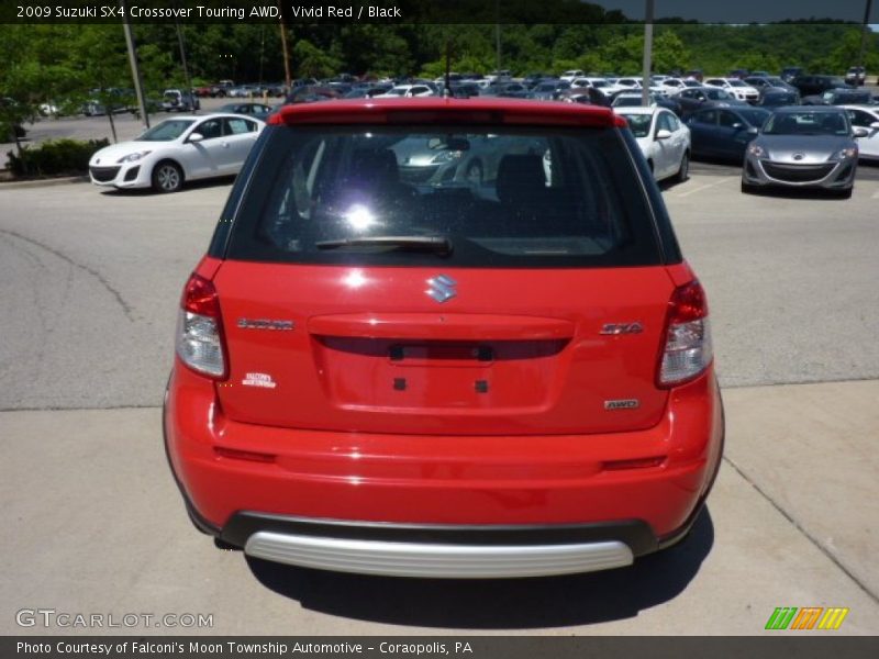 Vivid Red / Black 2009 Suzuki SX4 Crossover Touring AWD