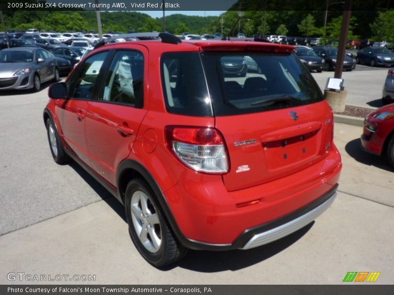 Vivid Red / Black 2009 Suzuki SX4 Crossover Touring AWD