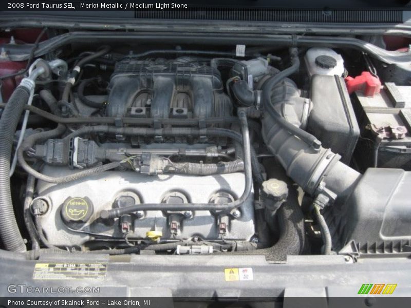 Merlot Metallic / Medium Light Stone 2008 Ford Taurus SEL