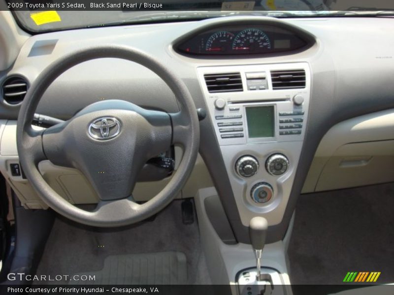 Black Sand Pearl / Bisque 2009 Toyota Yaris S Sedan