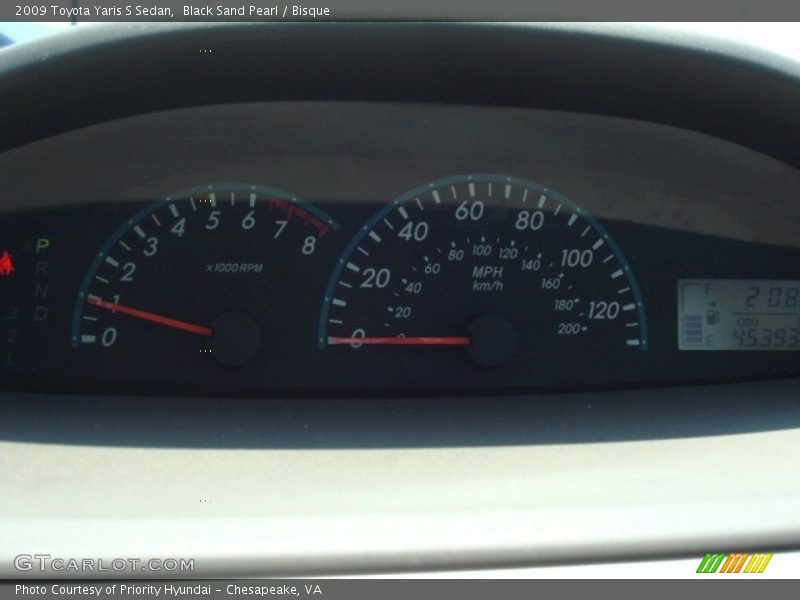 Black Sand Pearl / Bisque 2009 Toyota Yaris S Sedan