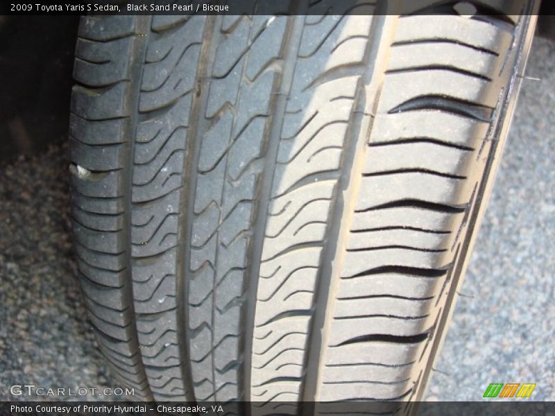 Black Sand Pearl / Bisque 2009 Toyota Yaris S Sedan