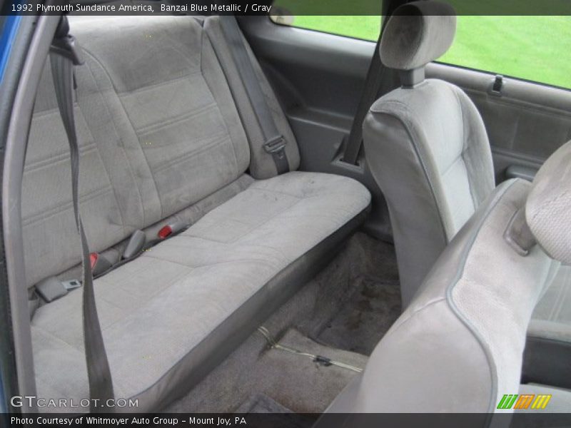 Banzai Blue Metallic / Gray 1992 Plymouth Sundance America