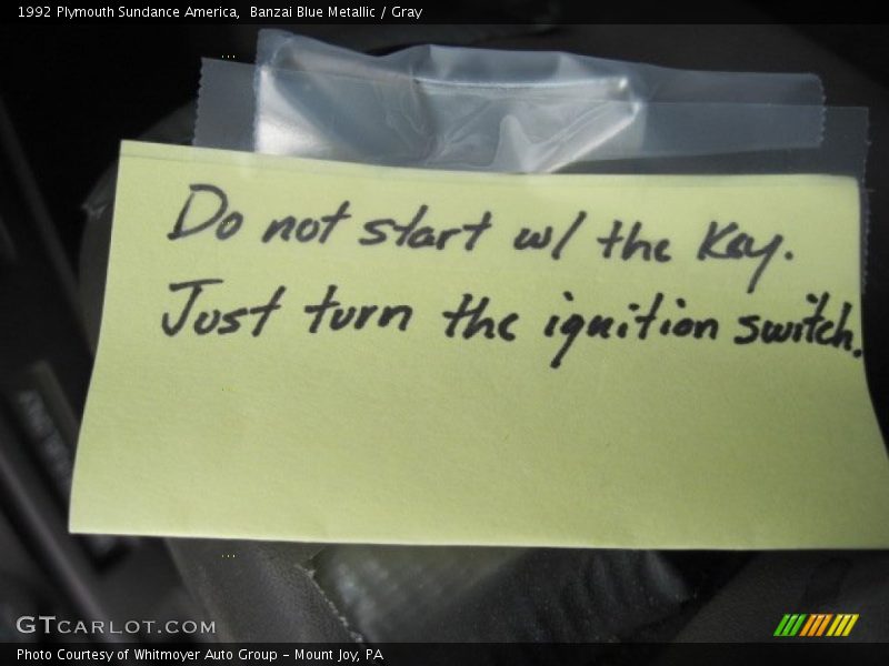 Banzai Blue Metallic / Gray 1992 Plymouth Sundance America
