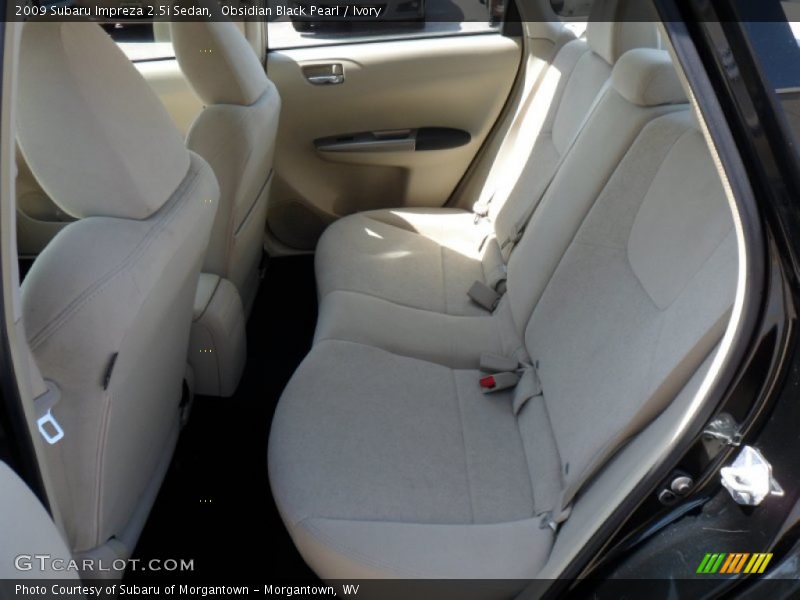 Obsidian Black Pearl / Ivory 2009 Subaru Impreza 2.5i Sedan