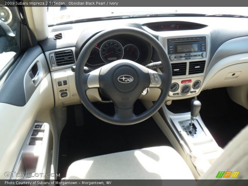Obsidian Black Pearl / Ivory 2009 Subaru Impreza 2.5i Sedan