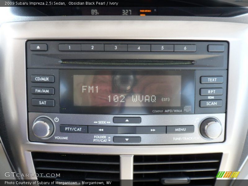 Obsidian Black Pearl / Ivory 2009 Subaru Impreza 2.5i Sedan