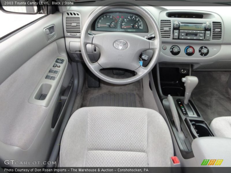 Dashboard of 2003 Camry LE V6