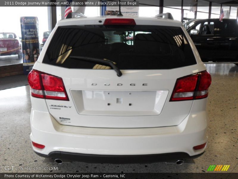 Bianco White / Black/Light Frost Beige 2011 Dodge Journey Mainstreet AWD