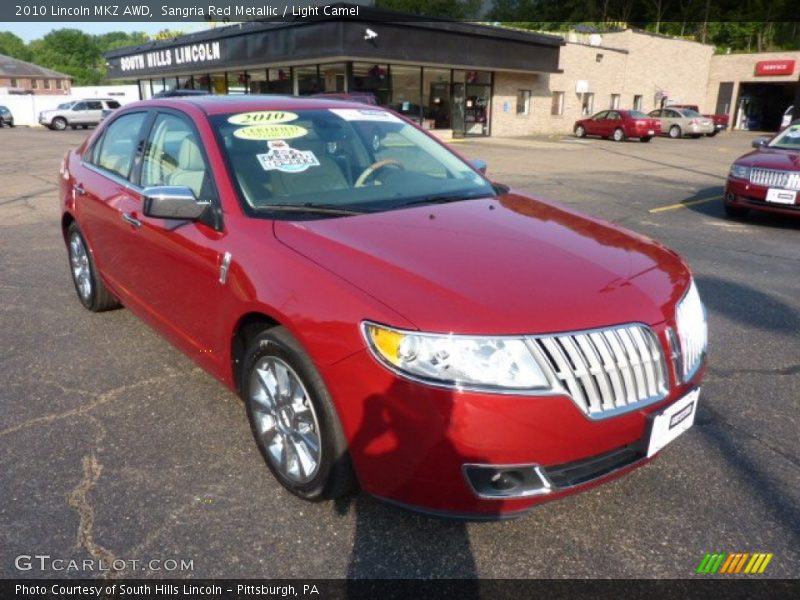 Sangria Red Metallic / Light Camel 2010 Lincoln MKZ AWD