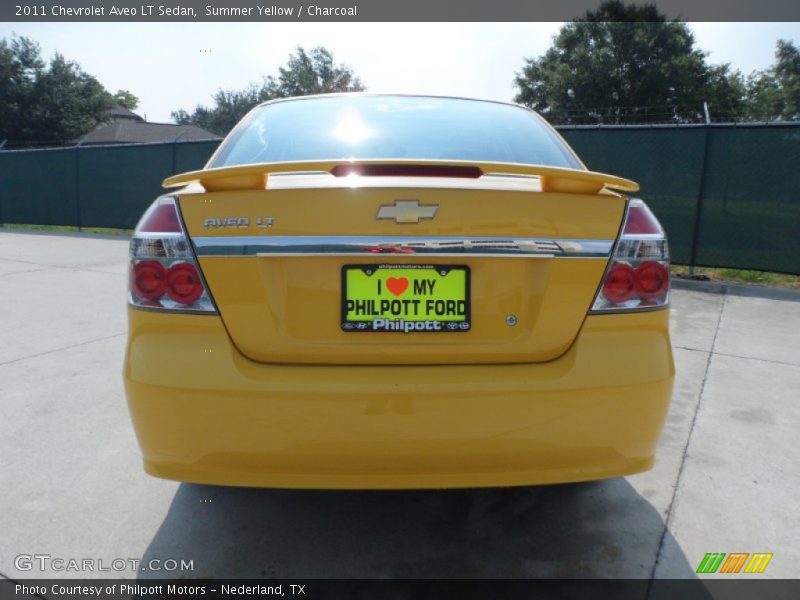Summer Yellow / Charcoal 2011 Chevrolet Aveo LT Sedan