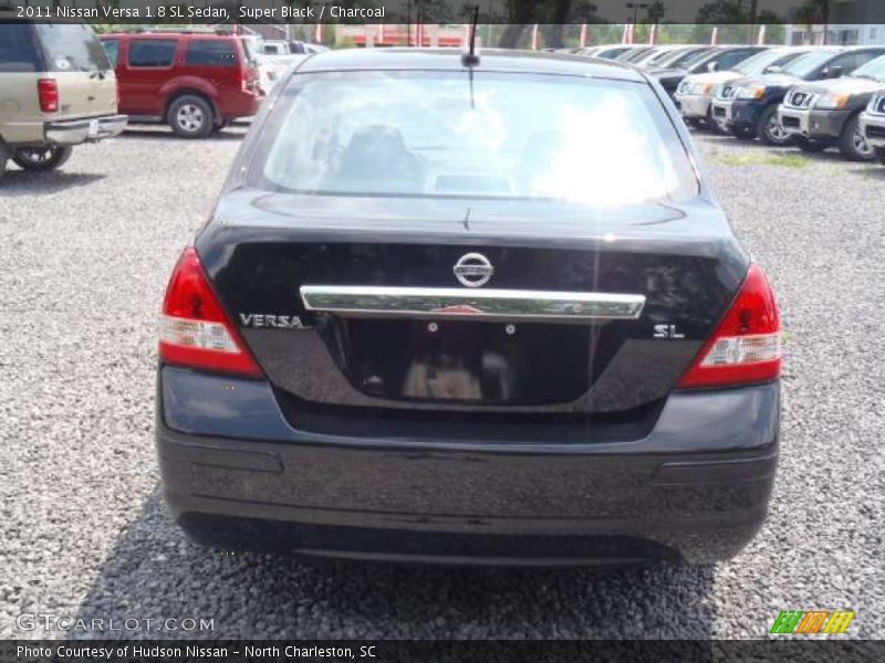 Super Black / Charcoal 2011 Nissan Versa 1.8 SL Sedan