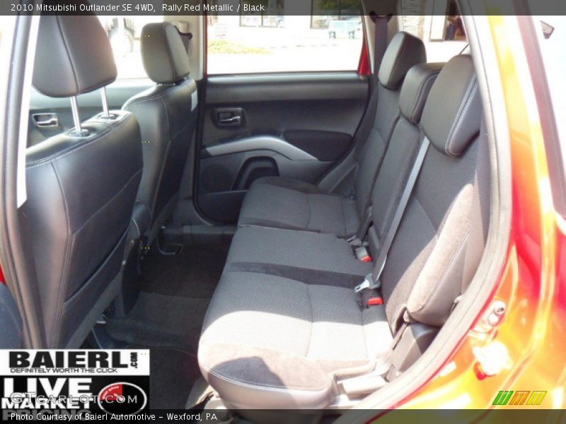 Rally Red Metallic / Black 2010 Mitsubishi Outlander SE 4WD