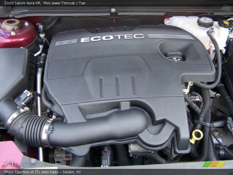 Red Jewel Tintcoat / Tan 2009 Saturn Aura XR