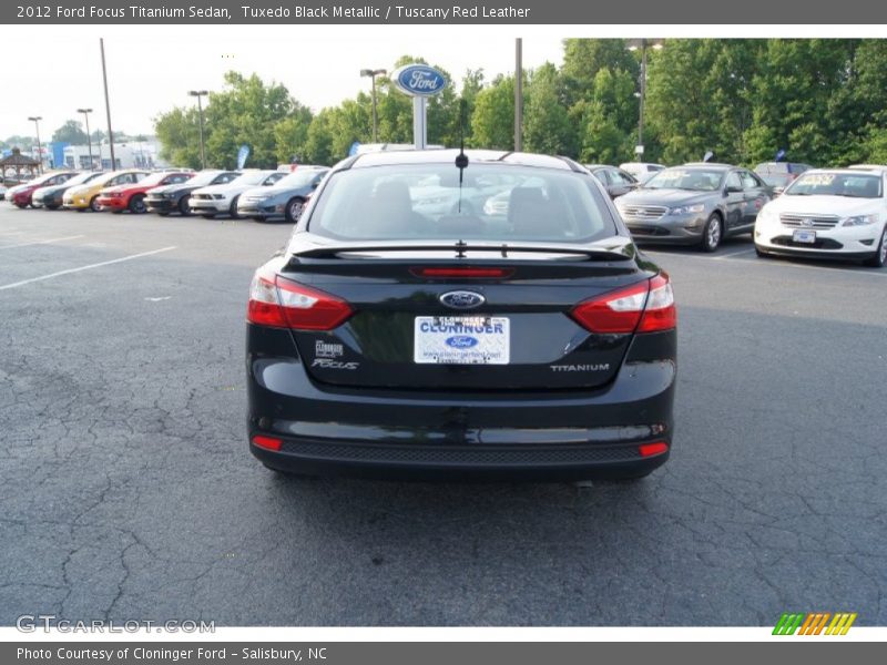 Tuxedo Black Metallic / Tuscany Red Leather 2012 Ford Focus Titanium Sedan