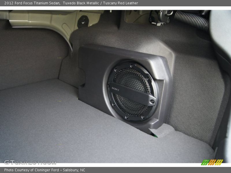 Tuxedo Black Metallic / Tuscany Red Leather 2012 Ford Focus Titanium Sedan
