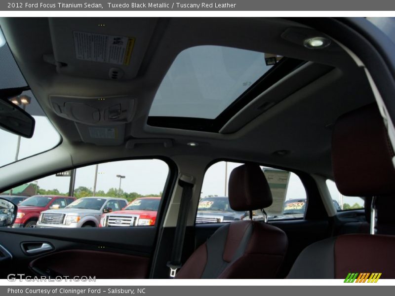 Tuxedo Black Metallic / Tuscany Red Leather 2012 Ford Focus Titanium Sedan