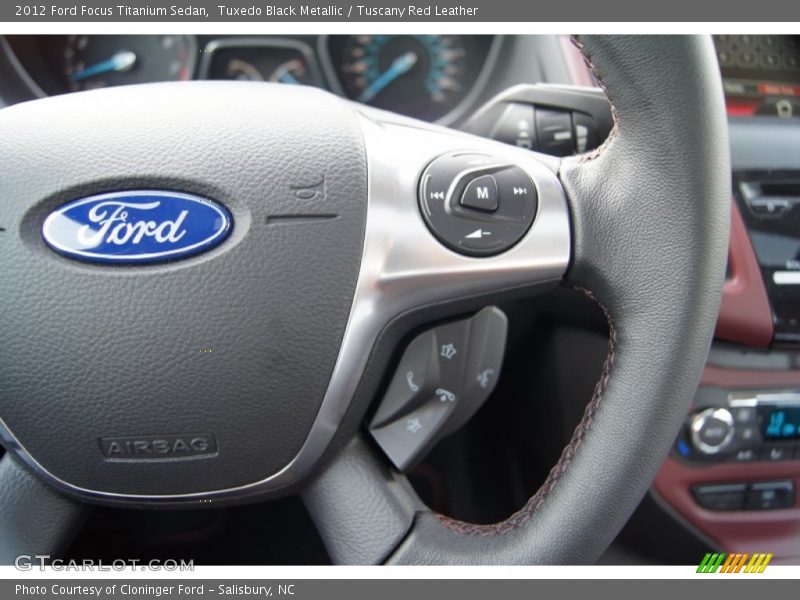 Tuxedo Black Metallic / Tuscany Red Leather 2012 Ford Focus Titanium Sedan
