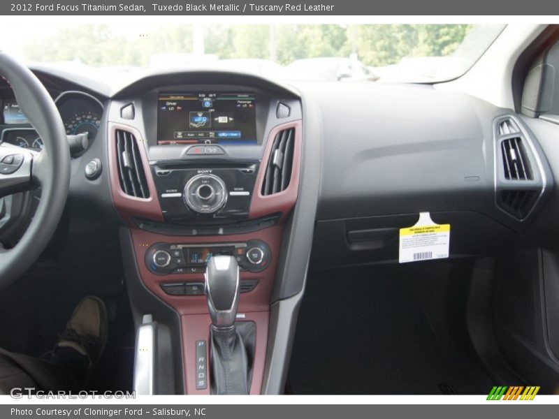 Tuxedo Black Metallic / Tuscany Red Leather 2012 Ford Focus Titanium Sedan