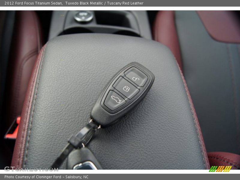 Tuxedo Black Metallic / Tuscany Red Leather 2012 Ford Focus Titanium Sedan