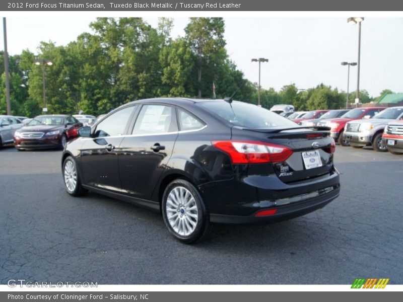 Tuxedo Black Metallic / Tuscany Red Leather 2012 Ford Focus Titanium Sedan