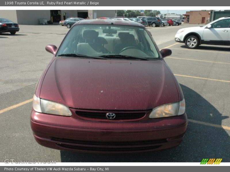 Ruby Red Pearl Metallic / Beige 1998 Toyota Corolla LE