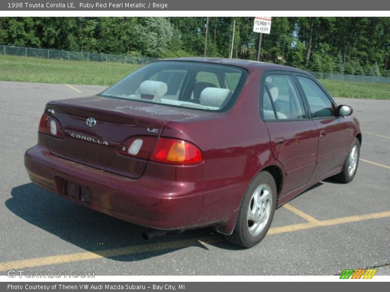 Ruby Red Pearl Metallic / Beige 1998 Toyota Corolla LE