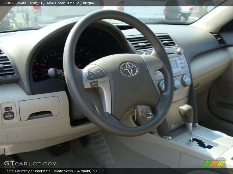 Aloe Green Metallic / Bisque 2009 Toyota Camry LE