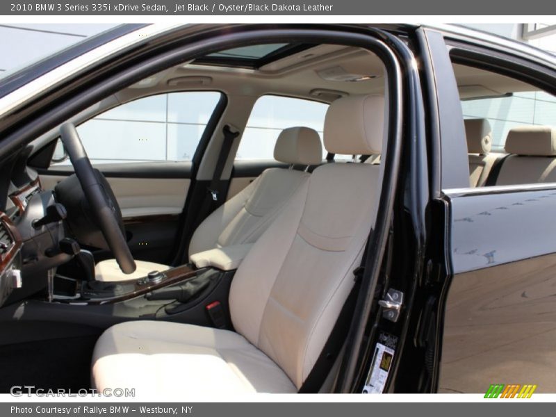  2010 3 Series 335i xDrive Sedan Oyster/Black Dakota Leather Interior