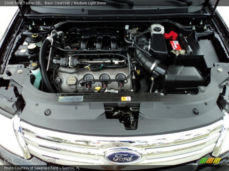 Black Clearcoat / Medium Light Stone 2008 Ford Taurus SEL