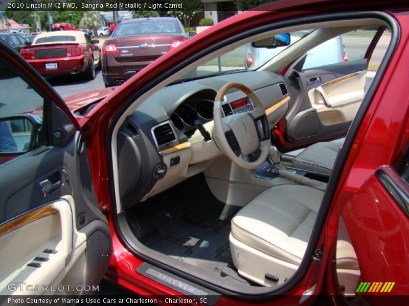 Sangria Red Metallic / Light Camel 2010 Lincoln MKZ FWD