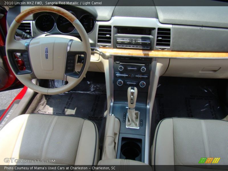 Sangria Red Metallic / Light Camel 2010 Lincoln MKZ FWD