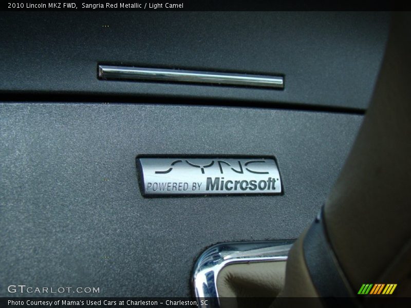 Sangria Red Metallic / Light Camel 2010 Lincoln MKZ FWD