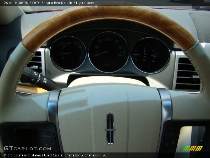 Sangria Red Metallic / Light Camel 2010 Lincoln MKZ FWD