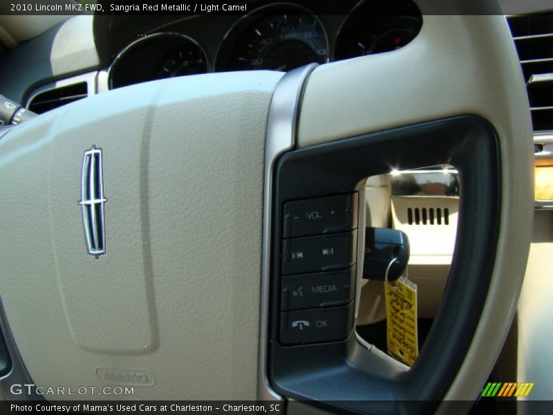 Sangria Red Metallic / Light Camel 2010 Lincoln MKZ FWD