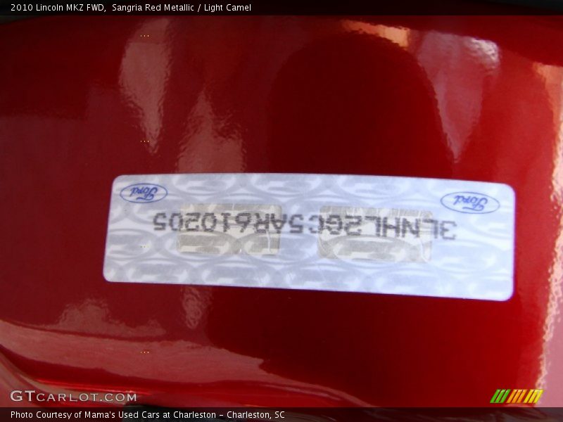 Sangria Red Metallic / Light Camel 2010 Lincoln MKZ FWD