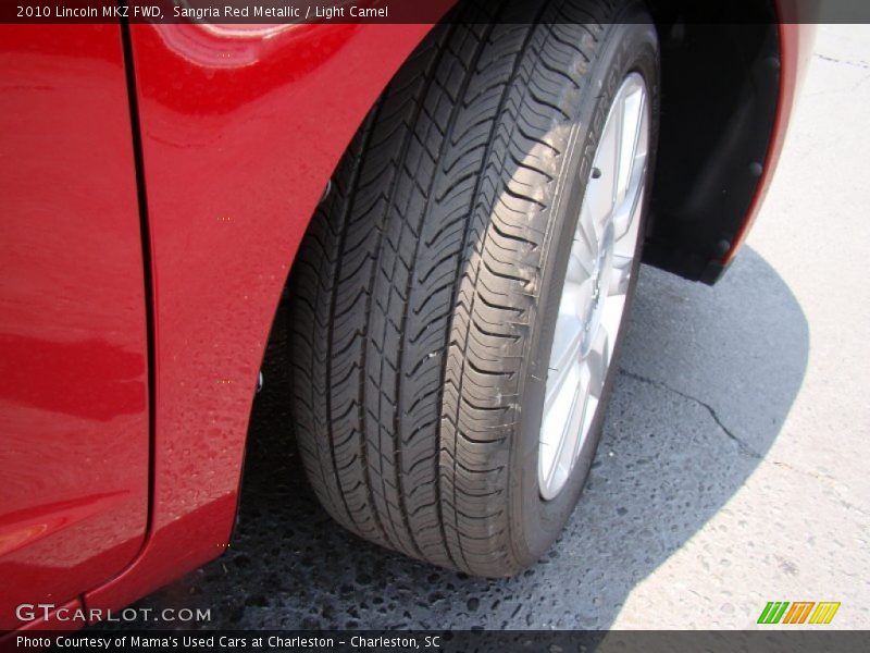 Sangria Red Metallic / Light Camel 2010 Lincoln MKZ FWD