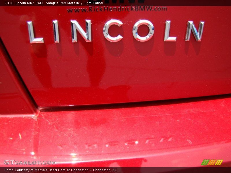 Sangria Red Metallic / Light Camel 2010 Lincoln MKZ FWD