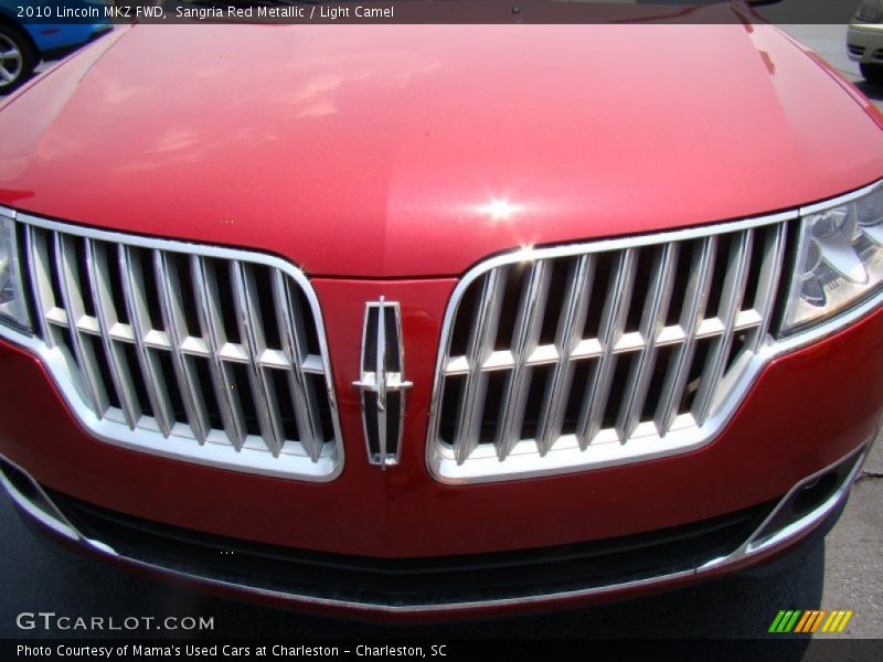 Sangria Red Metallic / Light Camel 2010 Lincoln MKZ FWD