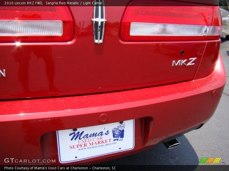 Sangria Red Metallic / Light Camel 2010 Lincoln MKZ FWD