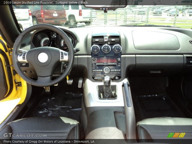 Dashboard of 2009 Sky Red Line Roadster