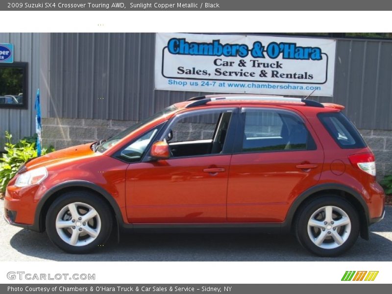 Sunlight Copper Metallic / Black 2009 Suzuki SX4 Crossover Touring AWD
