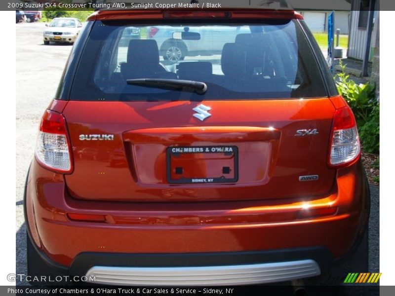 Sunlight Copper Metallic / Black 2009 Suzuki SX4 Crossover Touring AWD