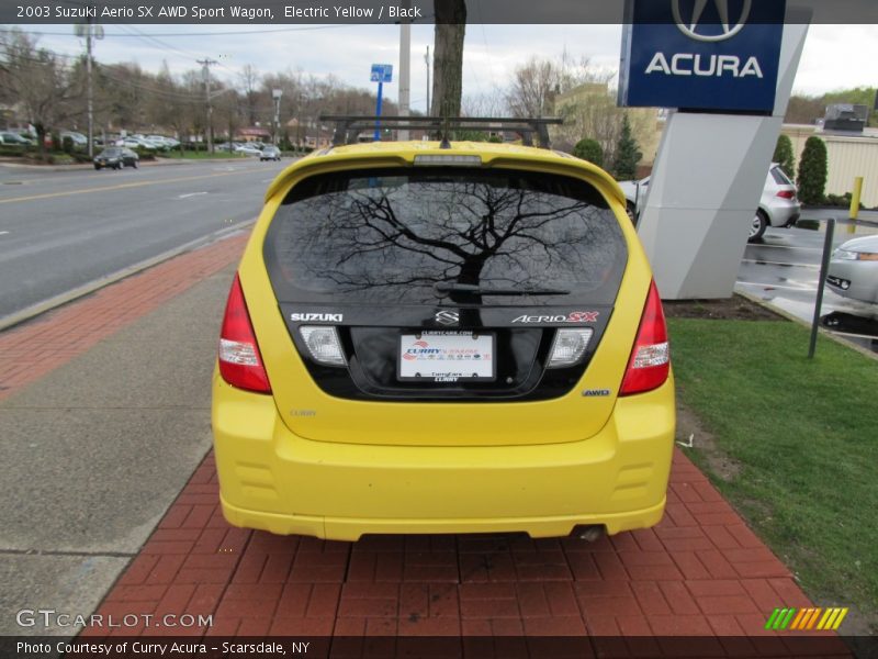 Electric Yellow / Black 2003 Suzuki Aerio SX AWD Sport Wagon