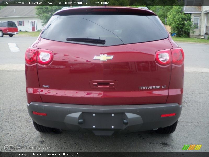 Red Jewel Metallic / Ebony/Ebony 2011 Chevrolet Traverse LT AWD