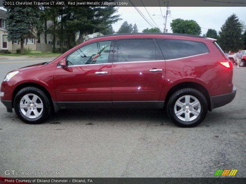 Red Jewel Metallic / Ebony/Ebony 2011 Chevrolet Traverse LT AWD