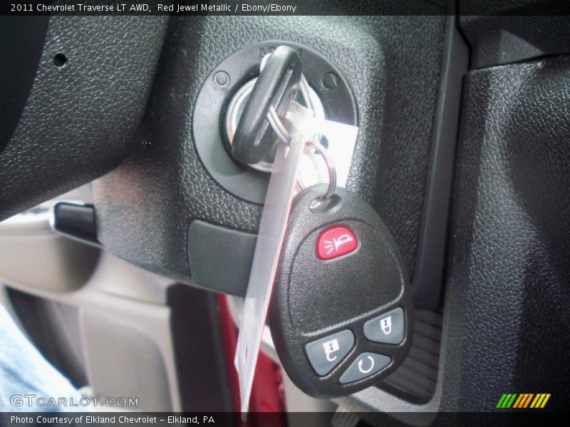 Red Jewel Metallic / Ebony/Ebony 2011 Chevrolet Traverse LT AWD