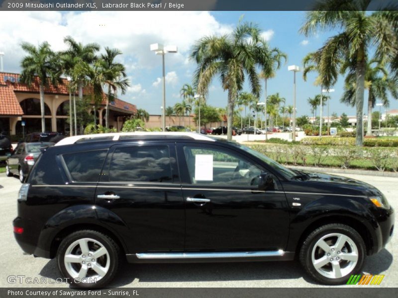  2009 Outlander XLS Labrador Black Pearl