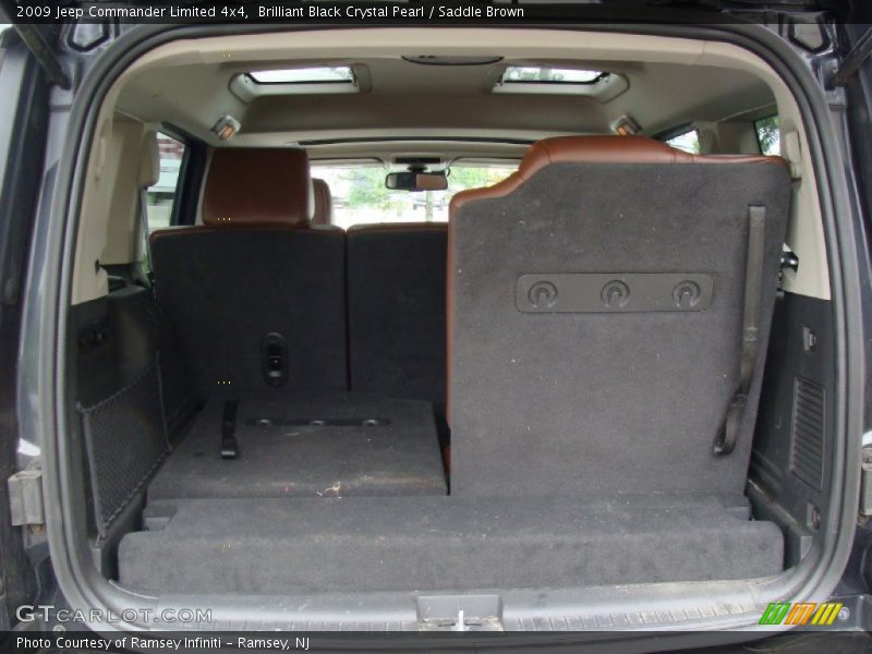 Brilliant Black Crystal Pearl / Saddle Brown 2009 Jeep Commander Limited 4x4